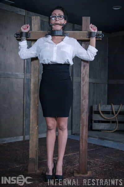 Secretary Lily Lane finds she is locked up and restrained in a play apartments